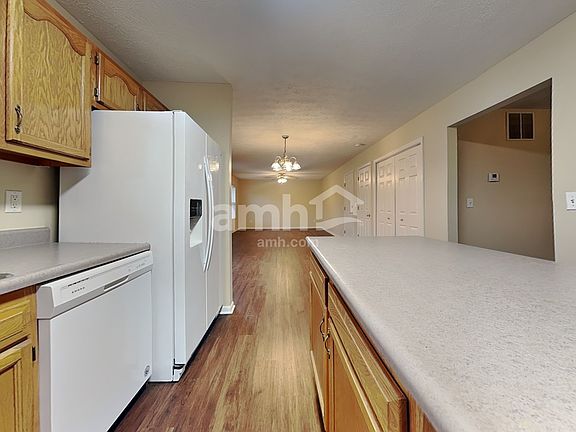 3rd image of 557 Whispering Pines Pl