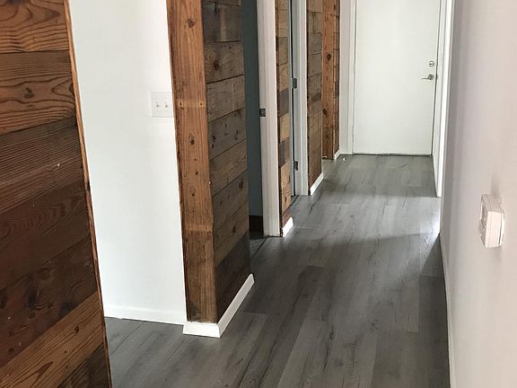 beautiful detail, shiplap walls in the hallway