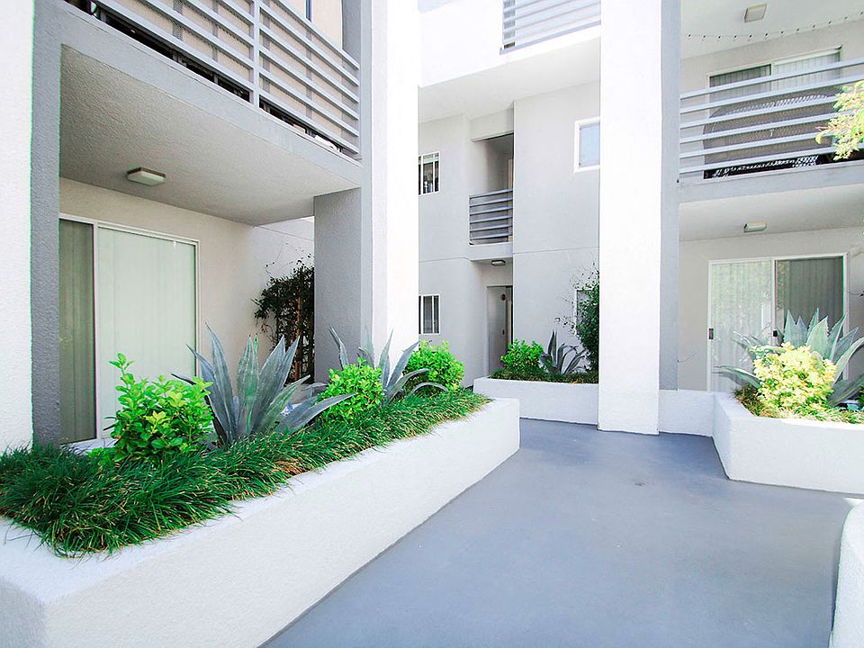 Lushly gardened interior courtyard.