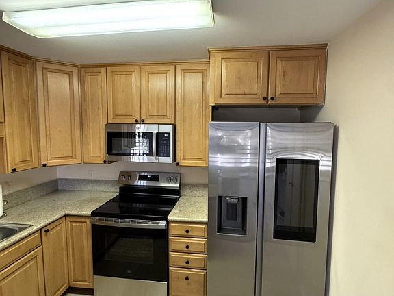 4th image of 6815 Remmet Ave Unit 218