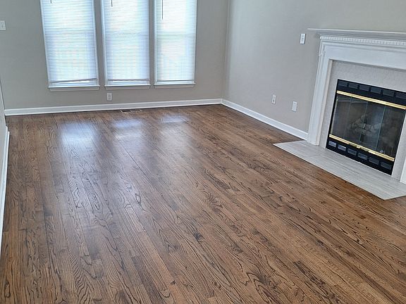 spacious living room with gas fireplace