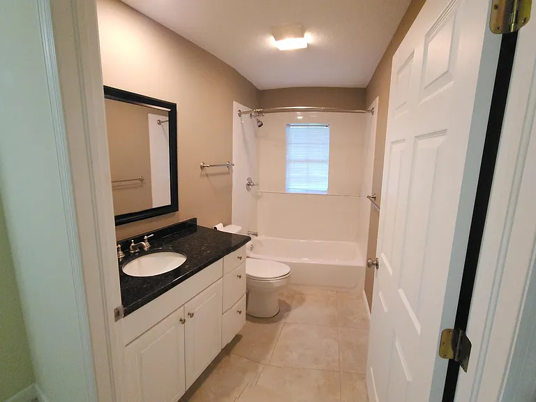 Hall bathroom with tub-shower