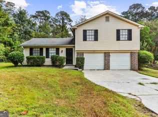 1152 Holly Hills Dr SW, Lilburn, GA 30047