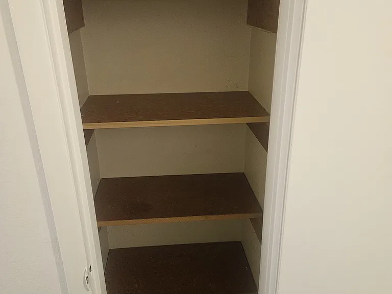 1 of 2 upstairs hall closets