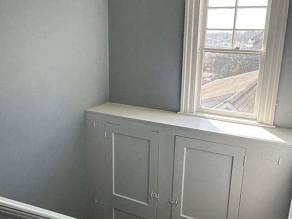 Stairway to apartment with storage