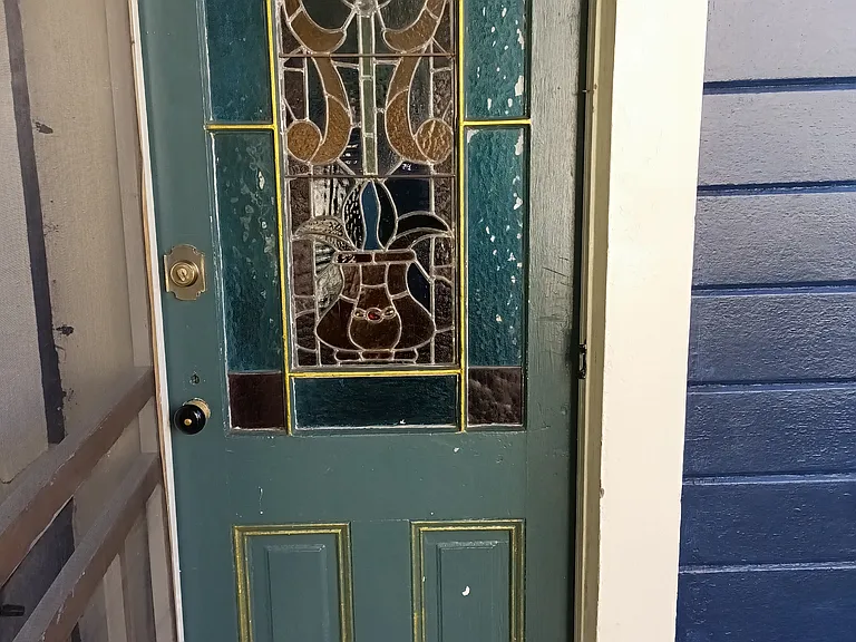 Welcome Home! Stained glass Front Entry and the golden accents.