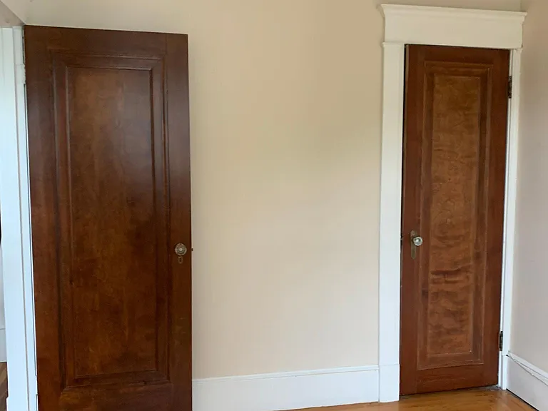 3rd bedroom with one closet. Hold queen size bed.