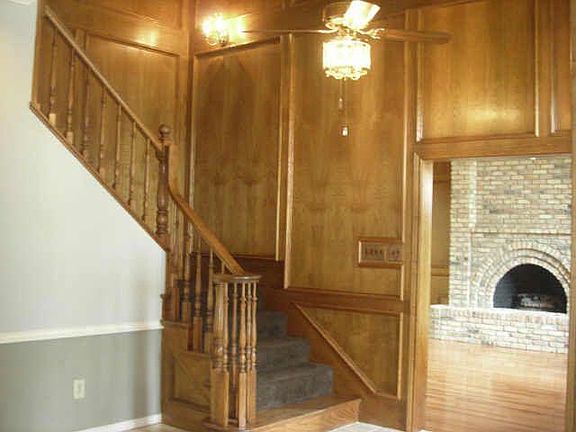 At foyer looking towards the staircase and living room