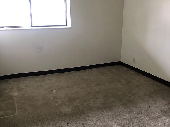 Bedroom looking toward window.