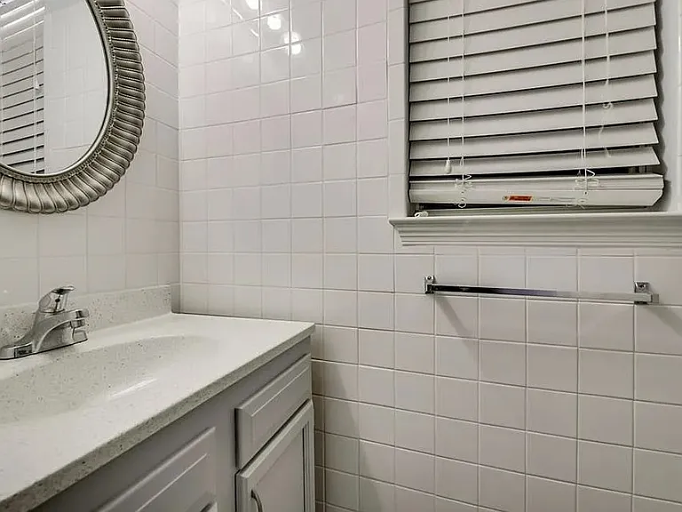 Downstairs - 1/2 Bathroom (off Kitchen Area)