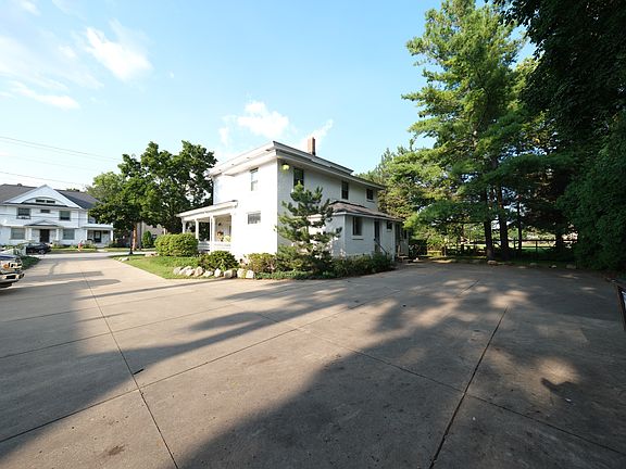 Rear of house and private parking. Studio Entrance is far right door.