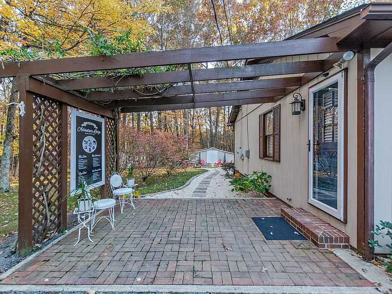Brick patio, can enter game room here at the side entrance.