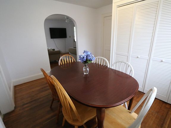 Dining room w/ view into living room (Washer and Dryer behin
