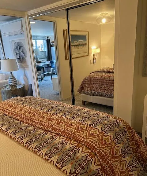 6" closet in bedroom with mirrored front