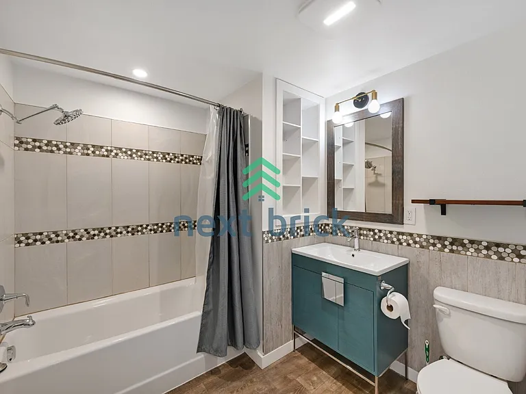 528 NE Serpentine Pl — Photo 13