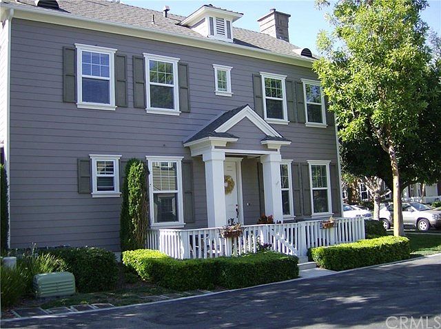 Beautiful cape cod, traditional home with white picket fence.