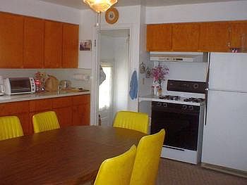 Large kitchen with lots of cupboards.