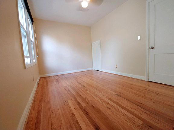 Bedroom downstairs with two closets.