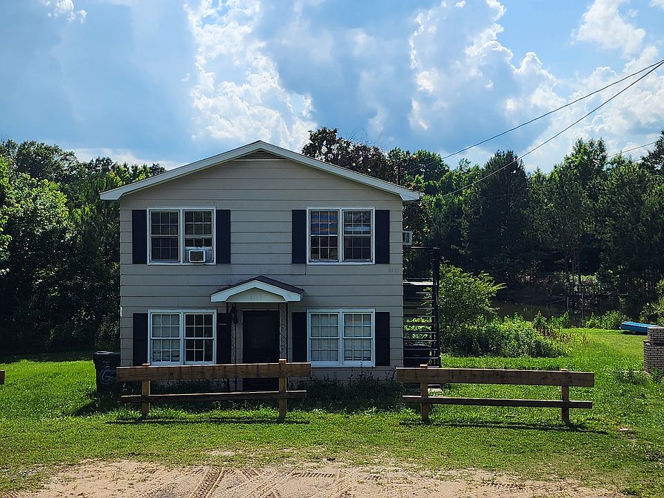 Photo of unit and available parking