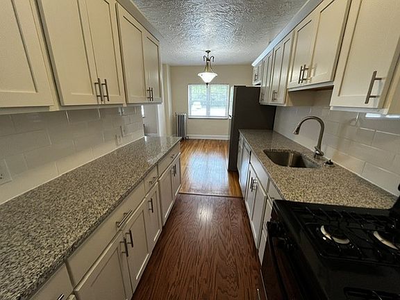 Edgewater Remodeled Kitchen. Granite Countertops and Soft touch cabinets