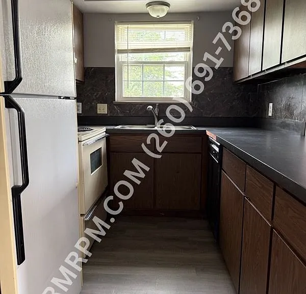 4802 Woodmark Dr — Photo 4