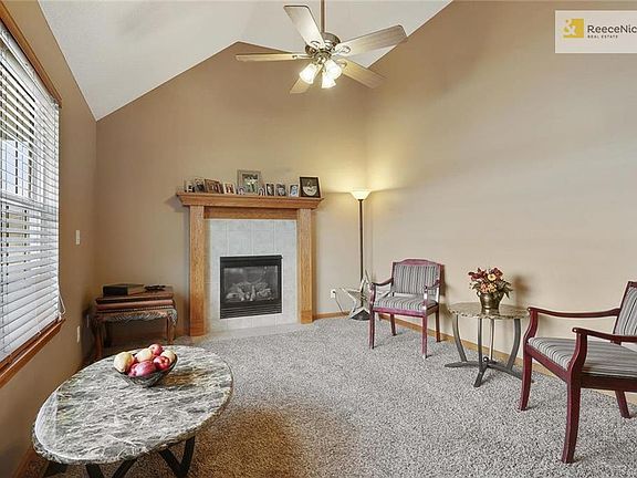 Vaulted great room greets you as you walk in the front door. Ceiling fan, fireplace with gas log.