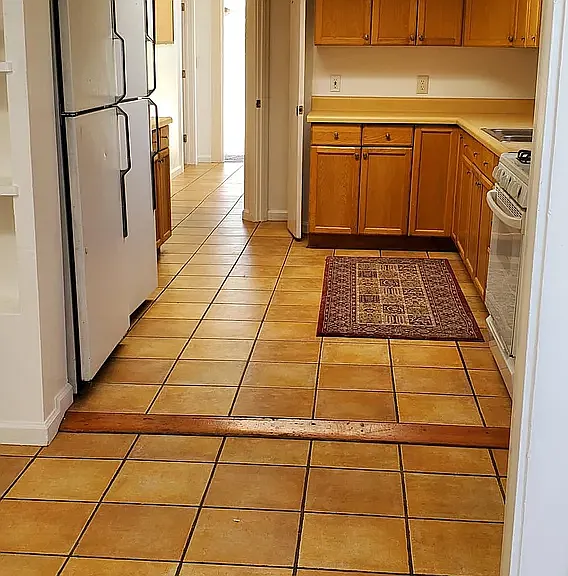 entrance to kitchen. includes 2 refrigerators, gas stove and lots of counter cabinets. 2 additional pantries.
