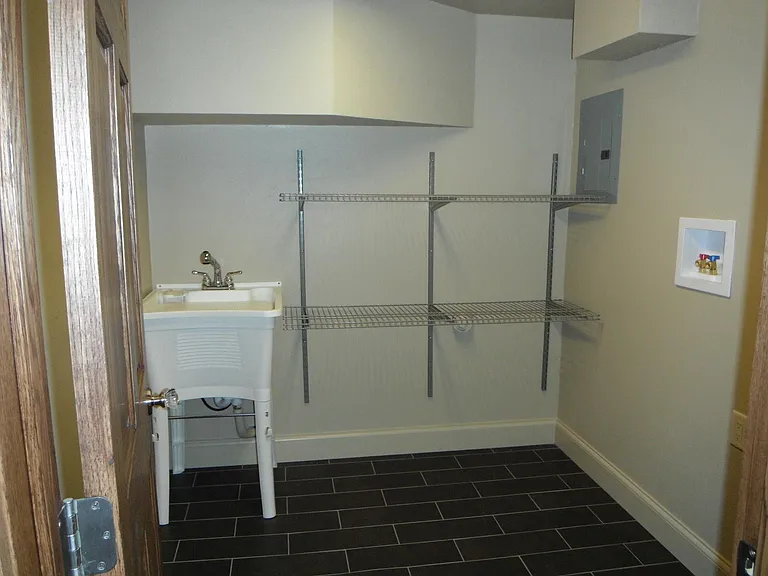 Laundry Room (Comes with Front Loading Washer and Dryer)