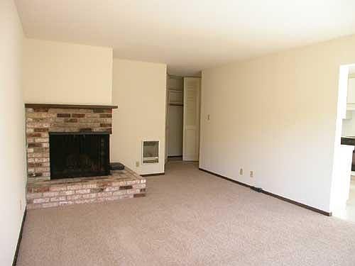 Living Room with wood-burning fireplace