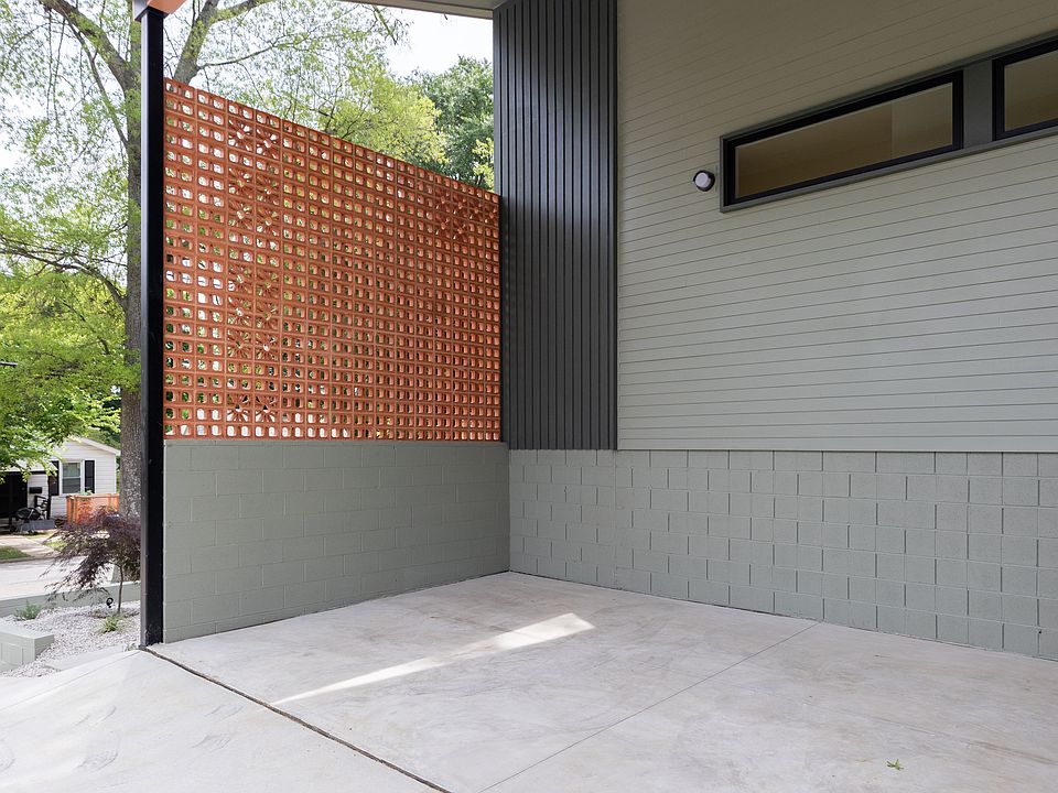 Carport and side of house from driveway