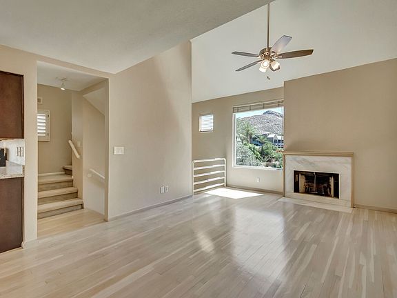 Living room from dining area, stairs going to upstairs bedrooms