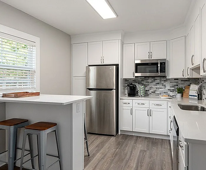 Experience elegance and functionality in this stylish kitchen.