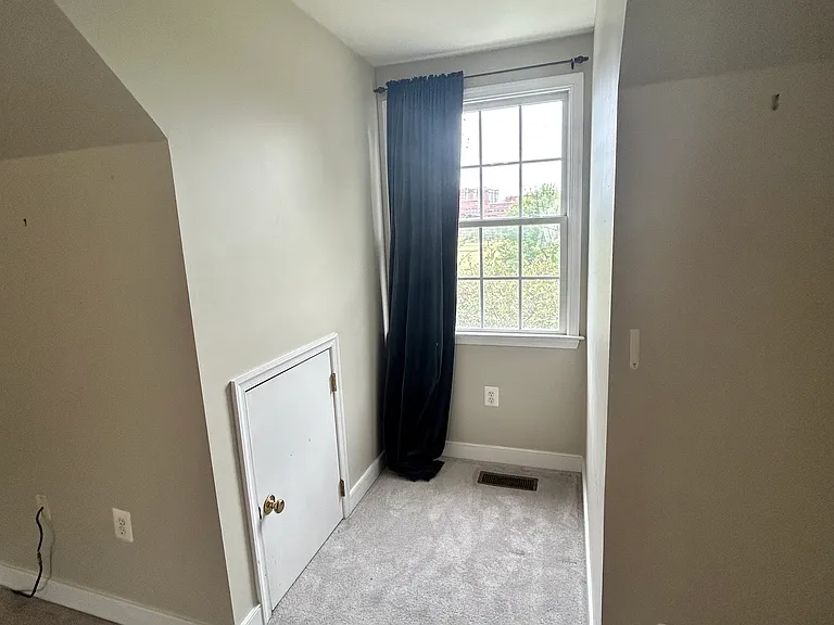 One of two dormer nooks, great for a home office with a view of a great park in front. You can even see the Alexandria anniversary fireworks from this window! Below is one of three storage spaces for all your storage needs!