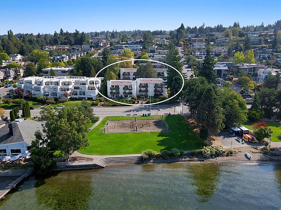 Right across from the building is the Houghton Beach Park with volleyball court, beach, restaurant, SUP rental and children play area.