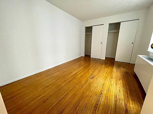 5th image of 121 E 12th St APT 2F