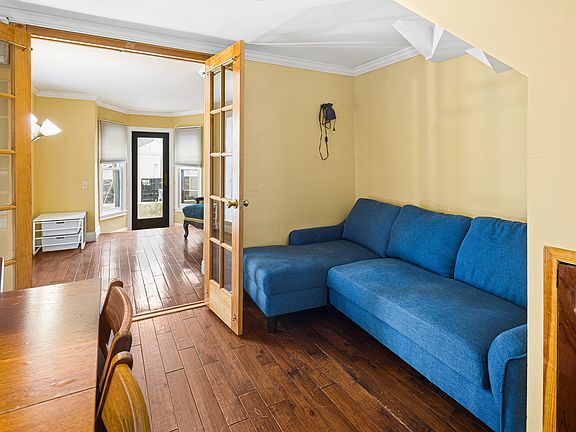 Living Room (Looking into Bedroom 2 and Outdoor Deck)