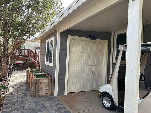 Garage and raised garden bed