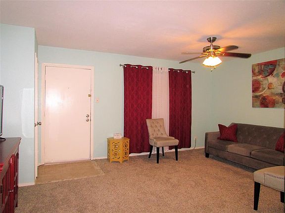 This smartly laid out condominium has a large front living room fresh paint and flooring through out the home.