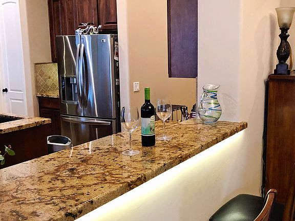 Pass-through bar to dining