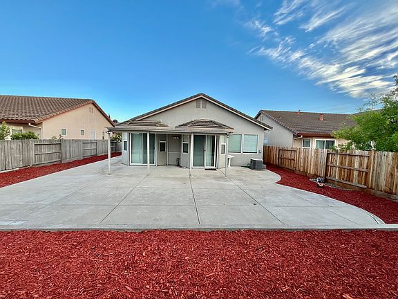 Nice patio and back yard for family enjoying outside