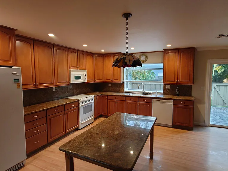 Open-concept Kitchen with access to Patio