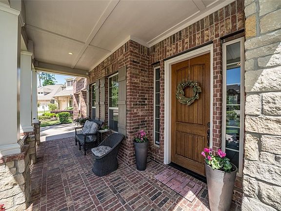Lovely Upgraded Brick & Stone Elevation w/Spacious Brick Covered Patio Perfect for Enjoying a Breeze, Chat with Neighbors or Just Hanging Out with the Family  & Watching the Kids Play Around the Culdesac