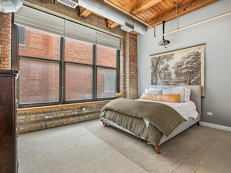 Primary bedroom with west-facing windows