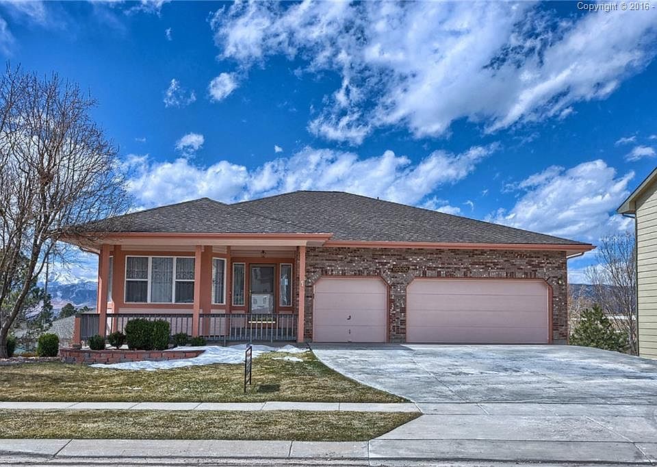 One of a kind rancher in Briargate with must see to believe views! Beautifully m