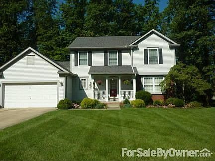 Macedonia Gem! : Four bedroom, two and a half bedroom colonial on wooded corner lot.