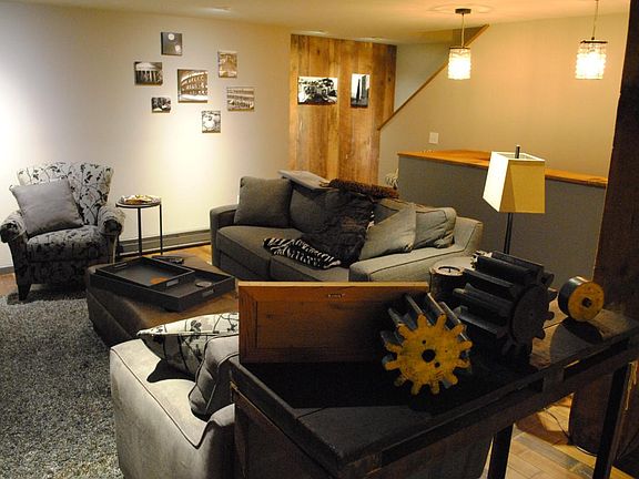 Beautiful Reclaimed Barnwood Finished Basement with Hardwood