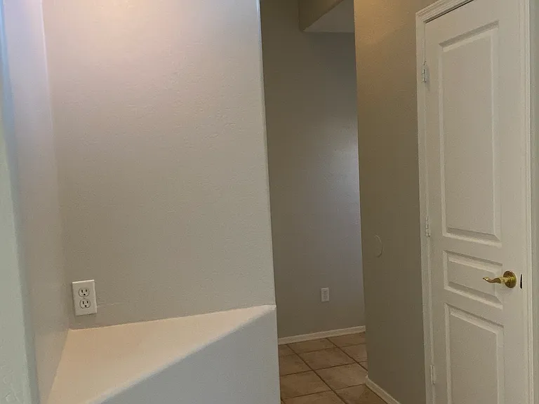 Hallway to guest bathroom and 2nd bedroom