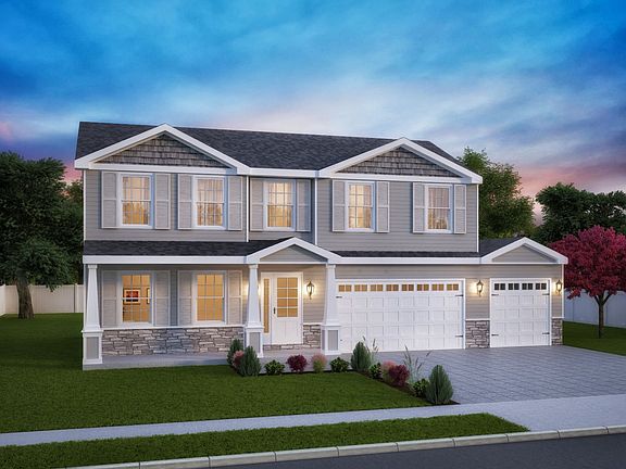 FoxGrove w Siding above 3 car with shutters w extended porch