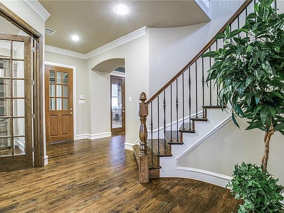 View of the entry way looking towards the dedicated study with french doors.