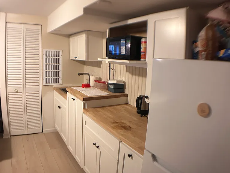 Downstairs kitchenette.